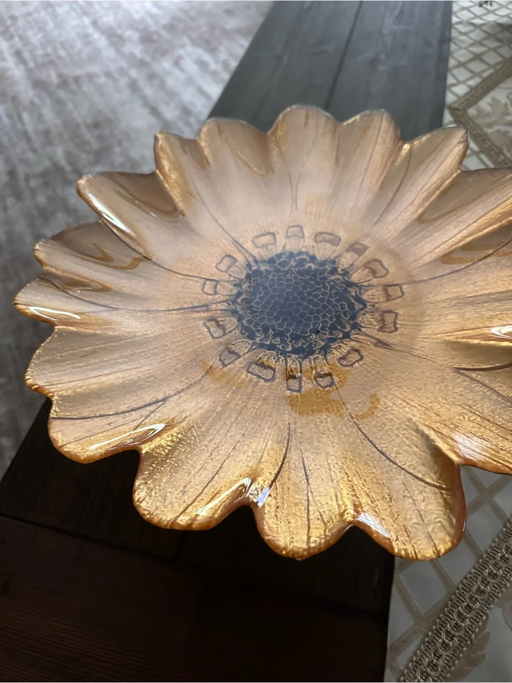 Gold sunflower glass decorative plate on a pedestal stand